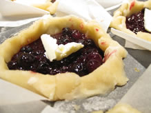 mini-pies-open-blueberry in muffin pan