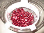 pomegranate in strainer