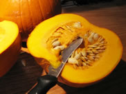 a fresh pumpkin cut in half